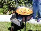 paella a punto de ser retirada del fuego